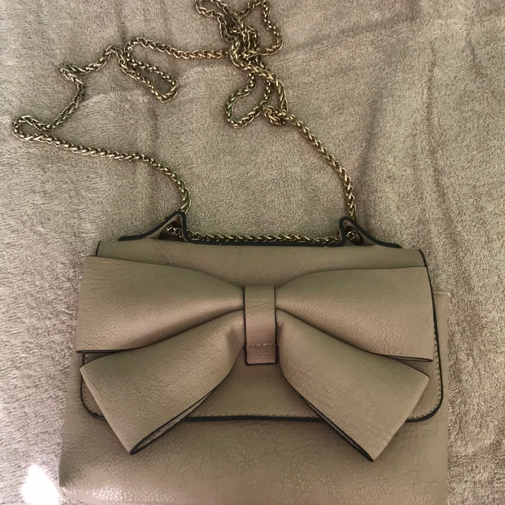 Chain tan cross body from charming Charlie’s